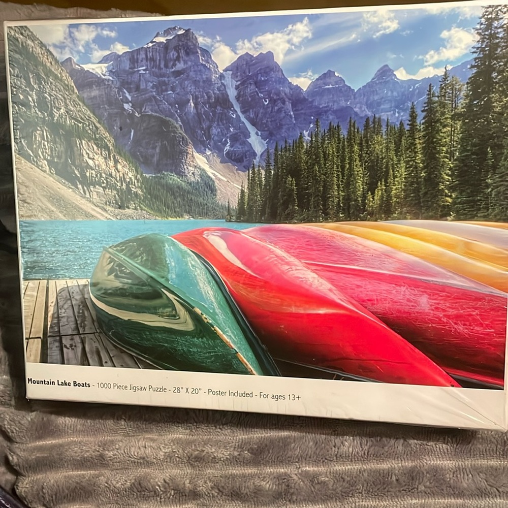 1000 piece puzzle “Mountain Lake  Boats”. Factory sealed.